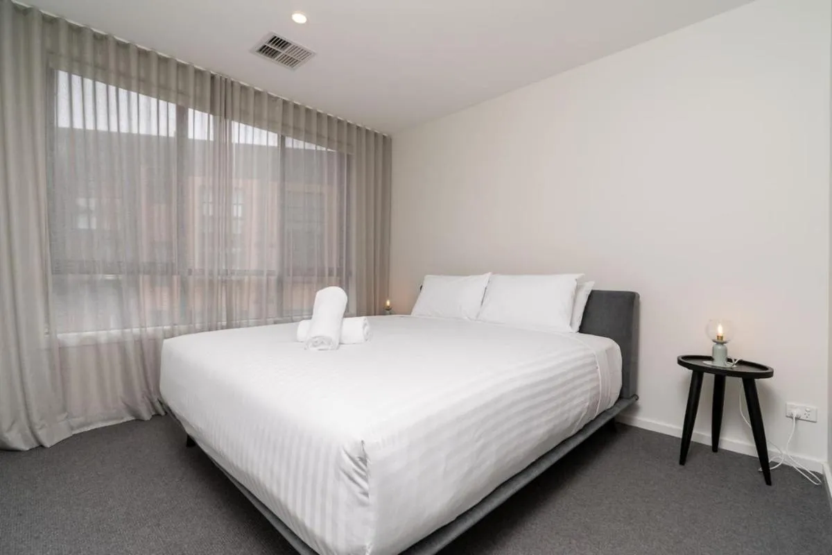 Image 1 of Contemporary Tri-Level APT in a Prime Central Spot – Hosted by Canstay