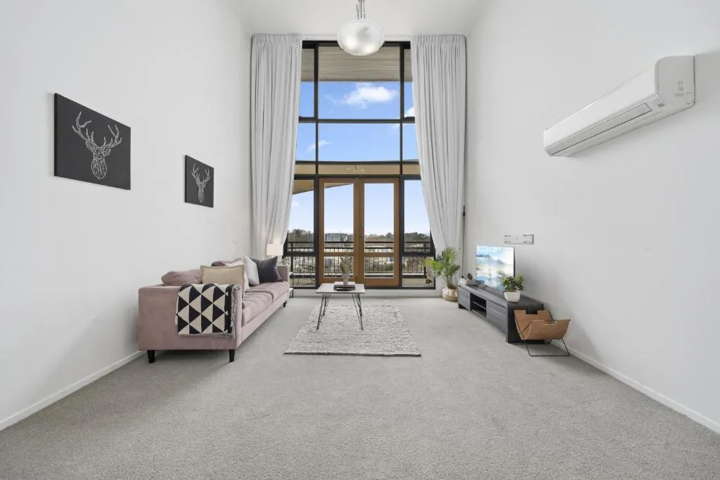 Image of Loft-Style CBD 1-Bed with Rooftop Terrace & BBQ