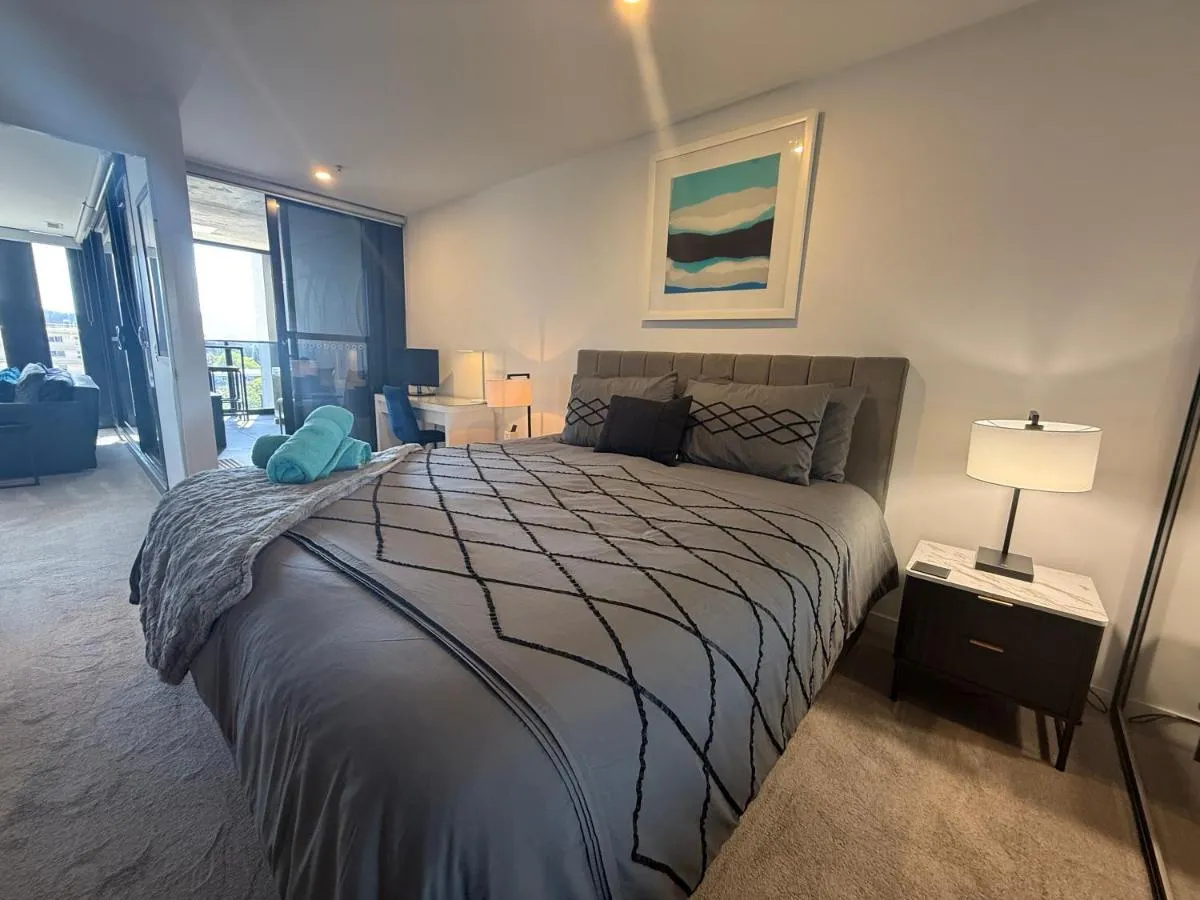 Image 1 of Midnight Luxe 1BR Apartment in the heart of Braddon Views from L7 Pool Sauna Gym Secure Parking Wifi Wine