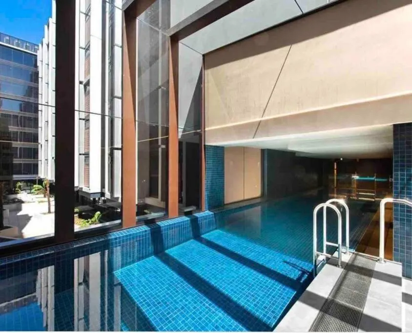 Image of Midnight Luxe 2BR 2Bath Apartment 408 in the heart of Braddon Pool Sauna L4 Views Secure Parking Wine WiFi